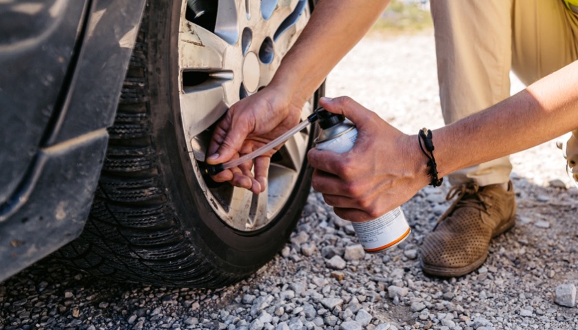 Tyre puncture sealant kit being used on tyre