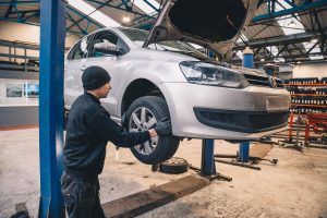 Mr Tyre mechanic performing tyre change