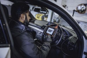 Car undergoing diagnostic testing.