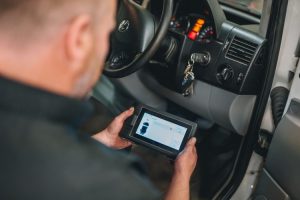 Mr Tyre Nottingham (Carlton Rd) mechanic performing car diagnostic checks on car